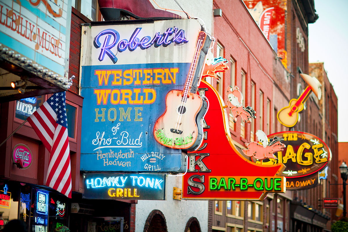 The signs on Broadway in Nashville, TN are shown.