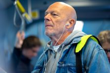 A man takes the train to work.