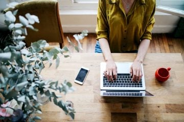 A woman works from home.