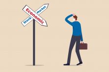 This illustration shows a businessman confused as the stock market increases but the economy does down.