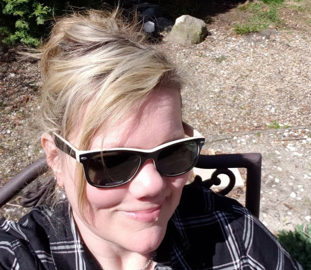 A white woman smiles at the camera in this selfie provided by Missy Eckstein who had a positive experience with a Telehealth appointment. 