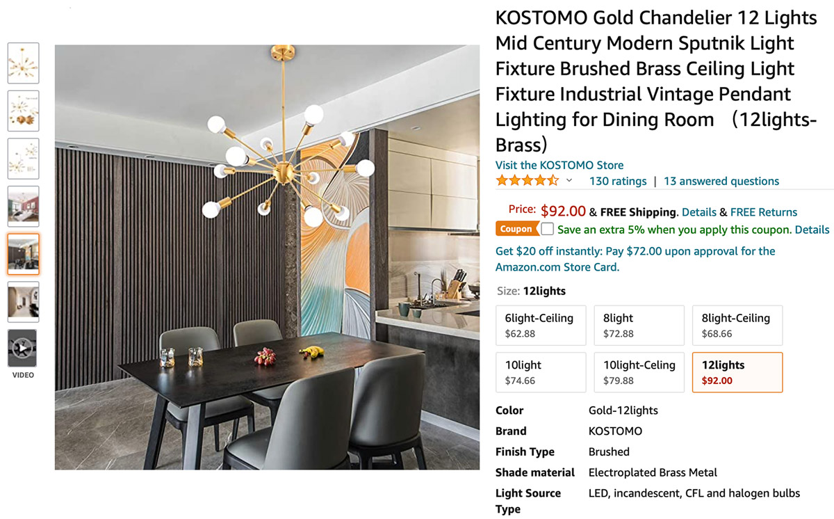 A gold Sputnik chandelier sits above a dining room table in this screenshot taken from Amazon.