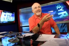 Dave Ramsey, who talks about finances, records one of his old shows in his studio.