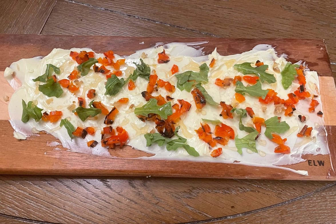 A photo of a butter board. 