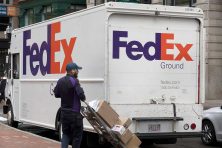 A fedex driver delivers packages in Boston, Massachusetts