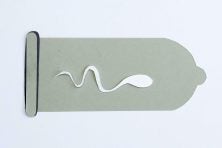 A sperm is in a medical tube in this cardboard cutout illustration.